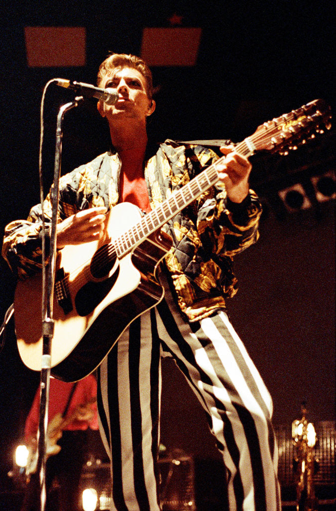 Detail of David Bowie performing on stage during a concert at the Barrowlands in Glasgow on his Tin Machine 