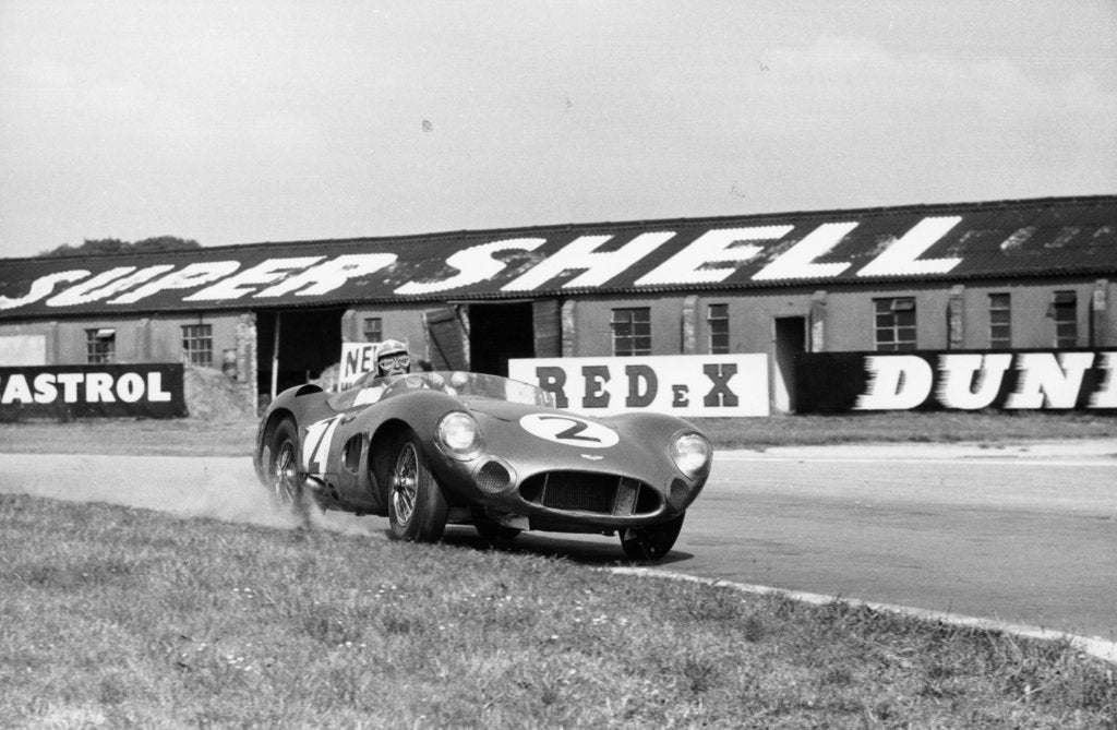 Detail of Carroll Shelby driving Aston Martin DBR1, TT race, Goodwood, Sussex, 1959 by Maxwell Boyd