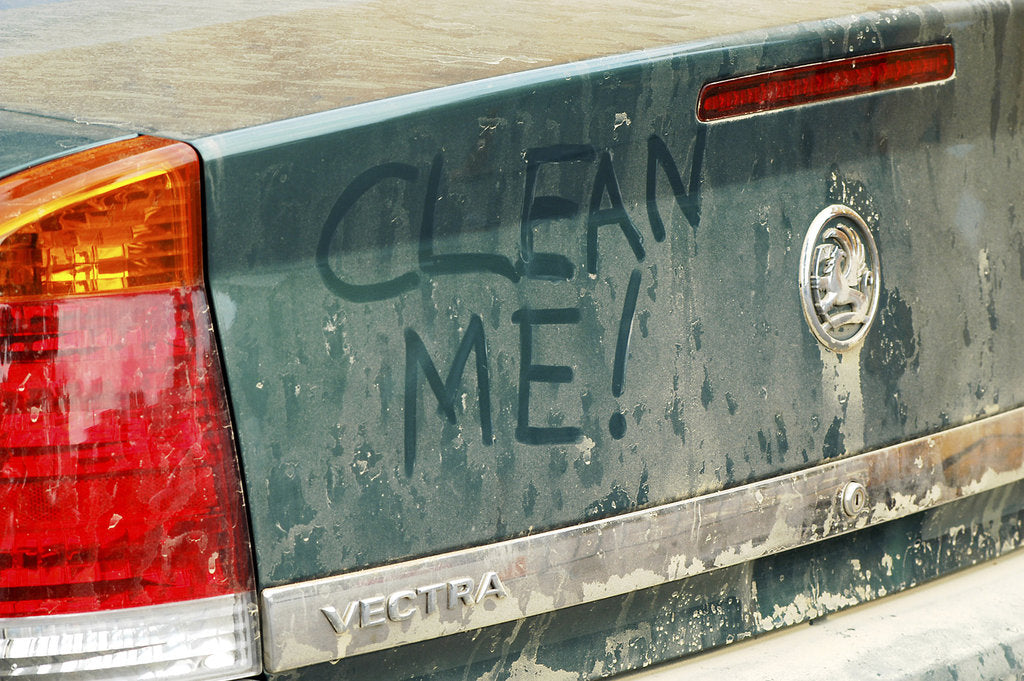 Detail of Graffiti on dirty Vauxhall Vectra 2003 by Unknown
