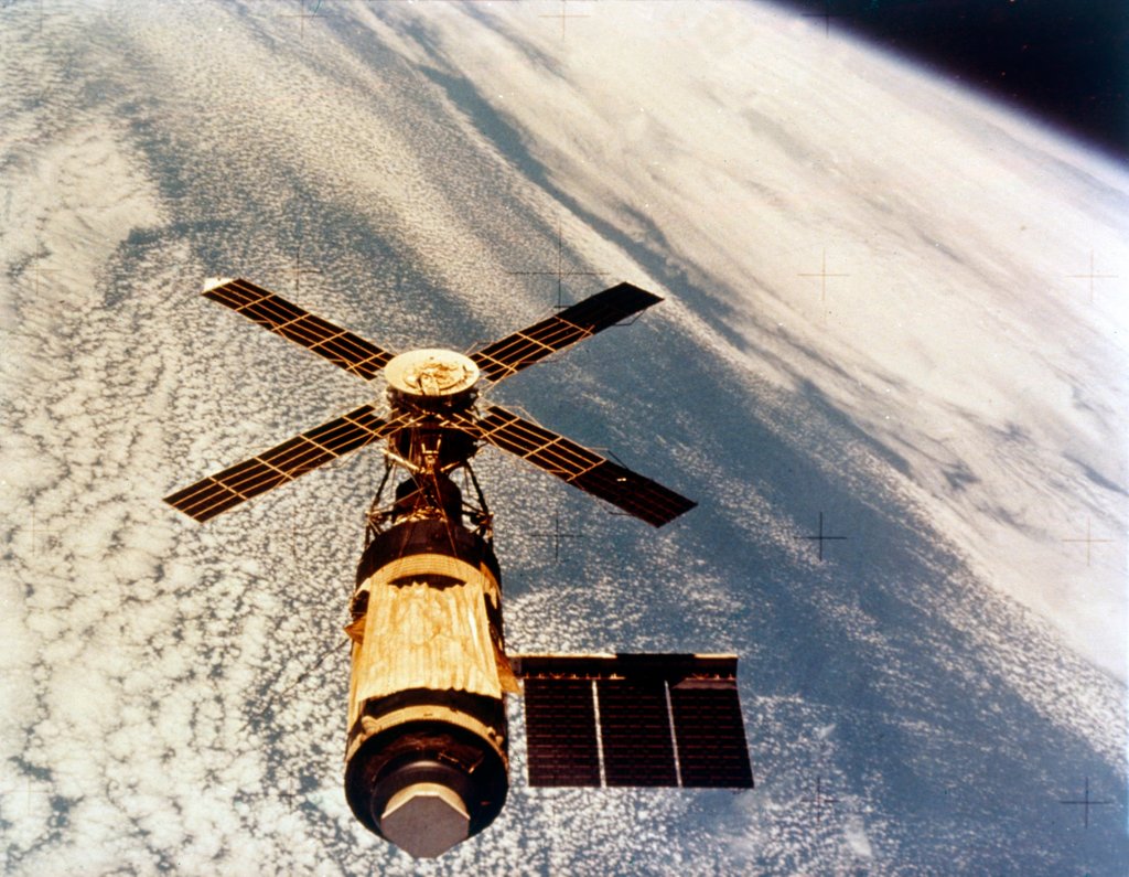 Detail of Skylab in orbit above Earth at the end of its mission, 1974 by NASA