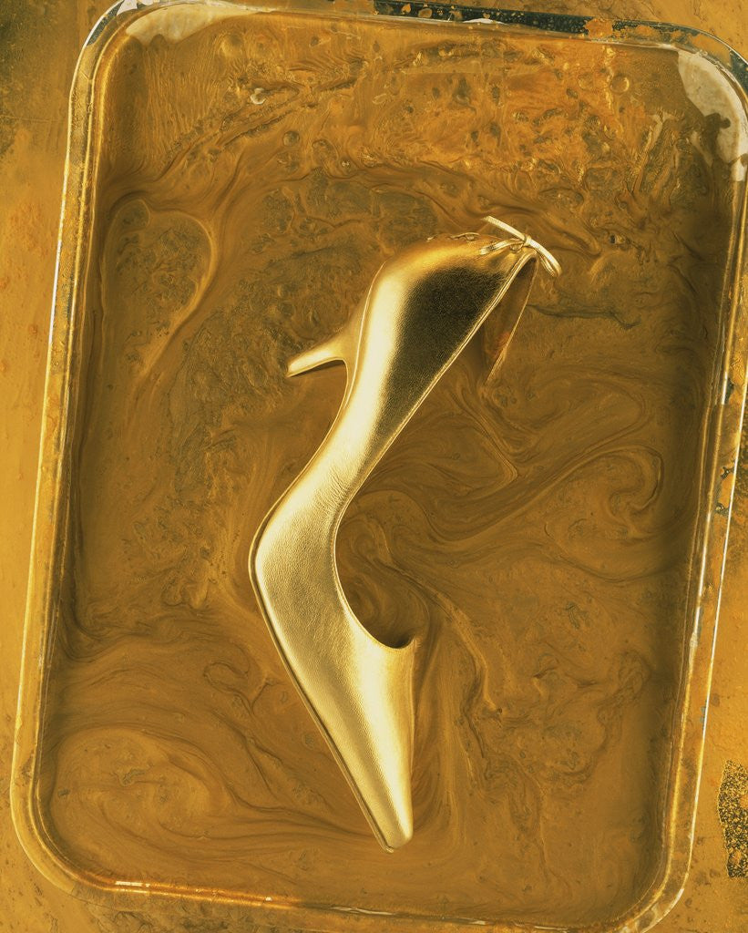 Detail of Golden High Heel Shoe by Corbis