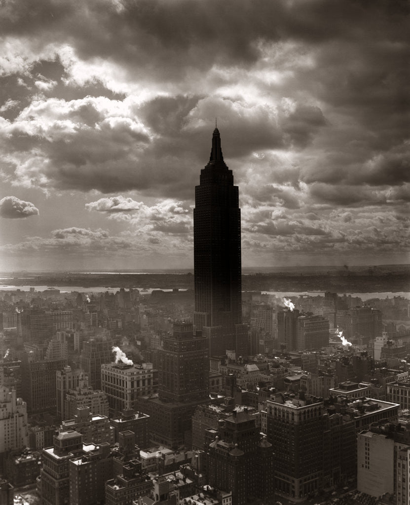 Detail of 1930s 1940s Empire State Building New York City In Storm Cloud Cover by Corbis