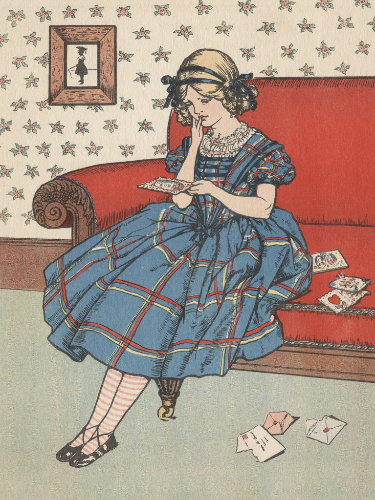 Detail of Little girl looking at Valentines cards by Corbis