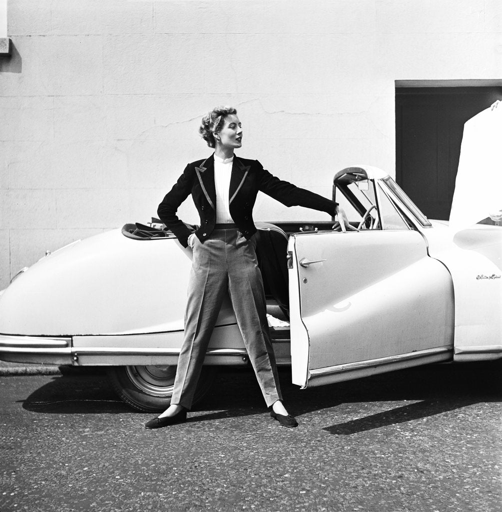 Detail of Model beside open door of Austin of England A90 Atlantic Sports saloon convertible by Elsbeth Juda