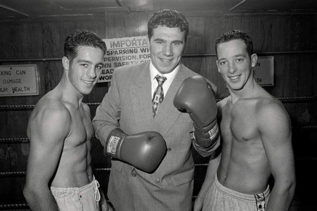 Detail of Boxing twins with their green grocer sponsor. 1989 by Bill Stephenson