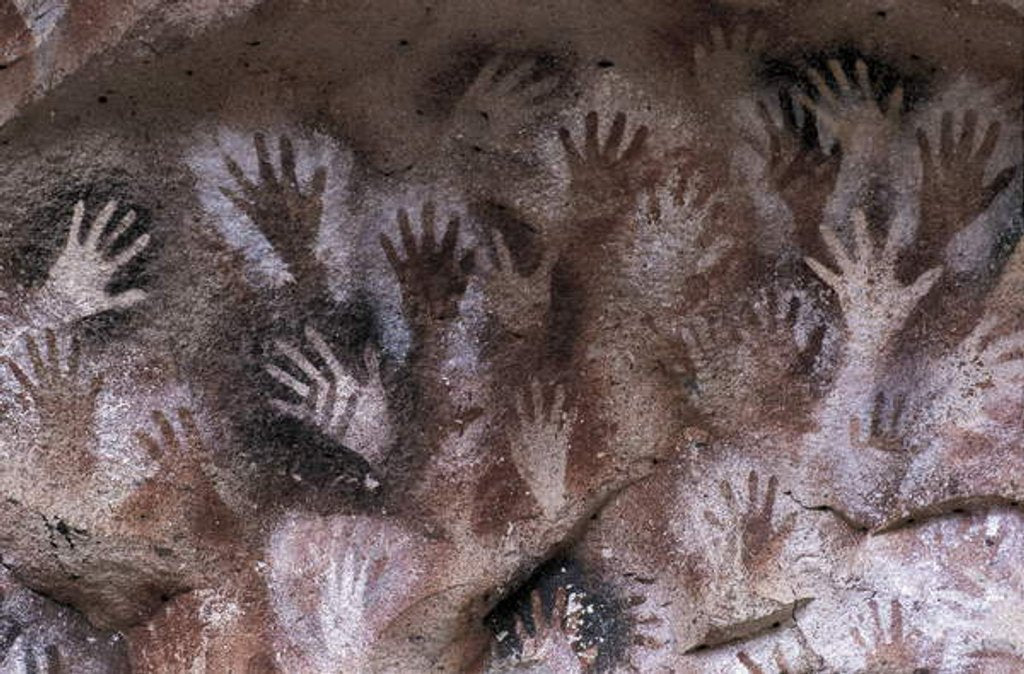 Detail of Prehistoric art : cave with hand prints 'Cave of the Hands' by Prehistoric Prehistoric