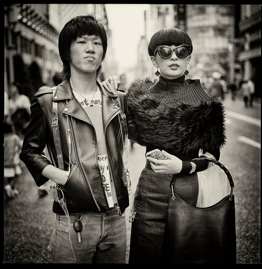 Detail of Tokyo street scene, couple in Ginza, Japan by Jon Nicholson