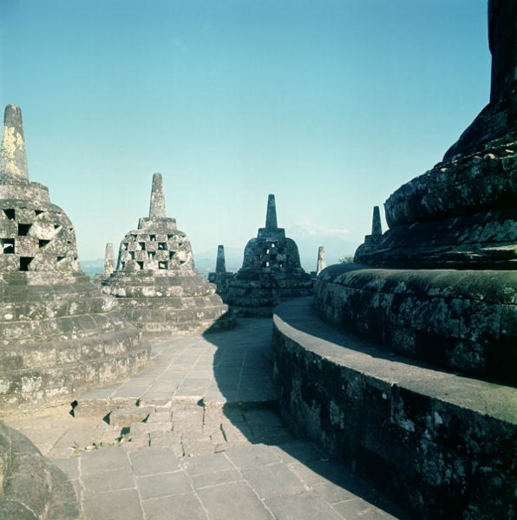 Detail of View of the uppermost circular terrace surrounded by latticed stupas or dagobs, erected c.800 AD by Anonymous