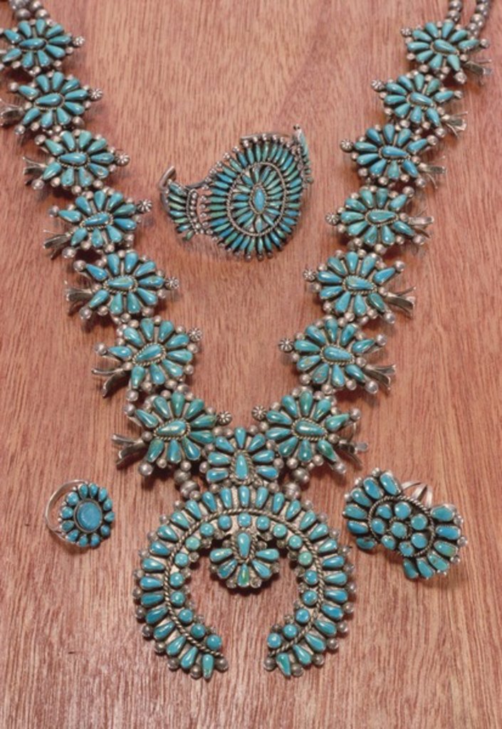 Detail of Navajo necklace, bracelet and rings by American School