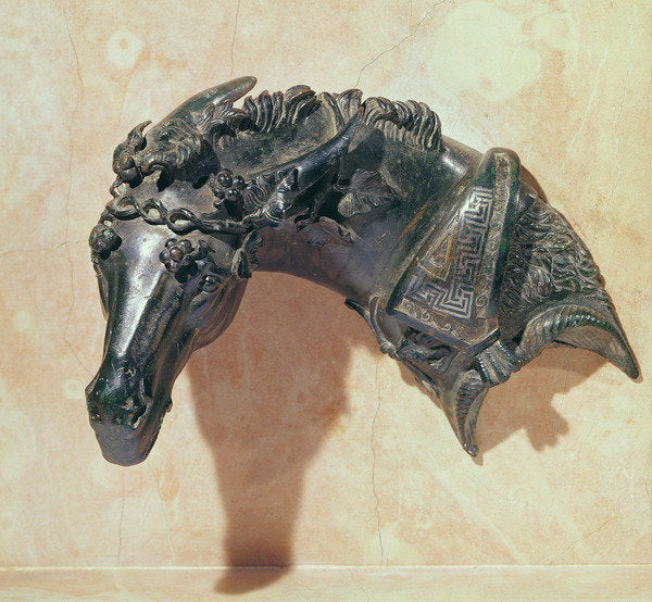 Detail of Head of a mule crowned with ivy, ornament from the armrest of a bed by Roman