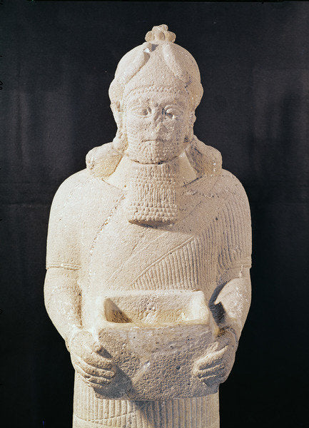 Detail of Statuette of a man carrying a box by Assyrian