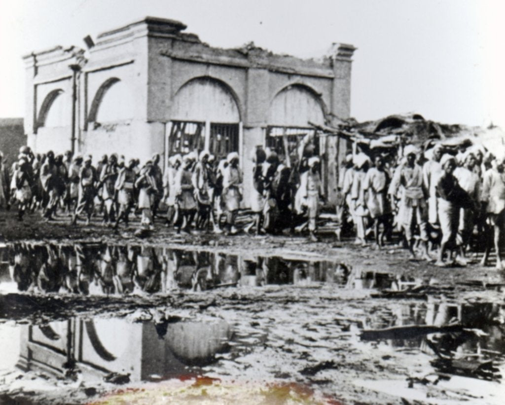 Detail of Prisoners passing the 'Mihrab,' the Khalifa's Prayer House, 1898 by English Photographer