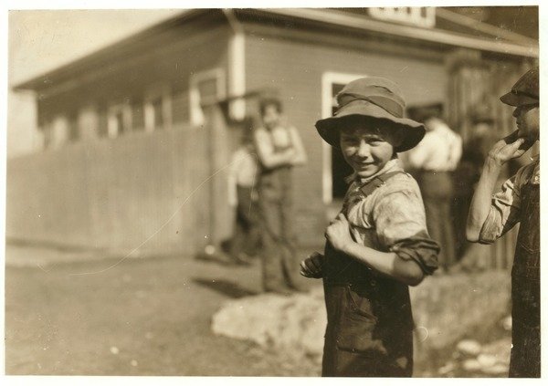 Detail of Ten year old Charlie Foster, unable to read, with a steady job at Merrimack Mills, Huntsville, Alabama, 1913 by Lewis Wickes Hine