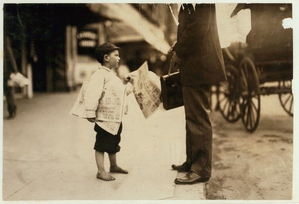 Detail of 6 year old newsboy Hyman selling papers until 6 p.m. in Lawrence, Massachusetts, 1911 by Lewis Wickes Hine