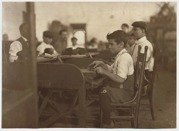 Detail of Child apprentice at De Pedro Casellas Cigar Factory, Tampa, Florida, 1909 by Lewis Wickes Hine