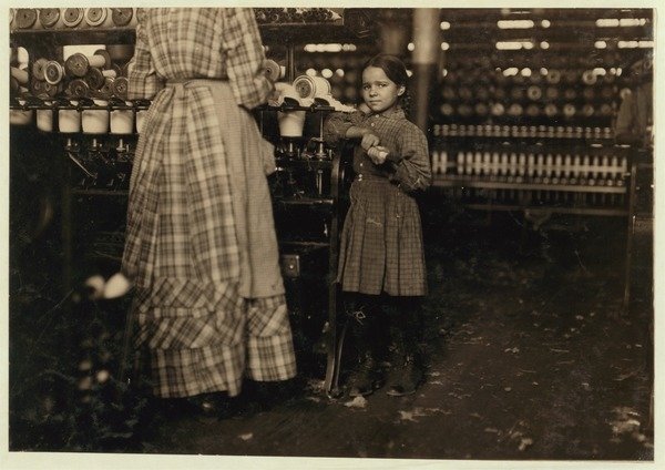 Detail of Fannie, 48 inches high, aged 7, one of 19 children helping her sister in Elk Mills, Fayetteville, Tennessee, 1910 by Lewis Wickes Hine