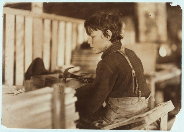 Detail of Boy making baskets for melons at Evansville, Indiana, 1908 by Lewis Wickes Hine
