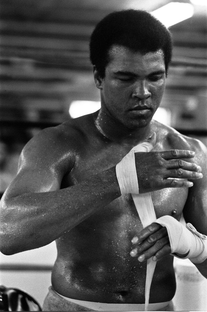 Detail of Muhammad Ali wrappings his hands by Staff