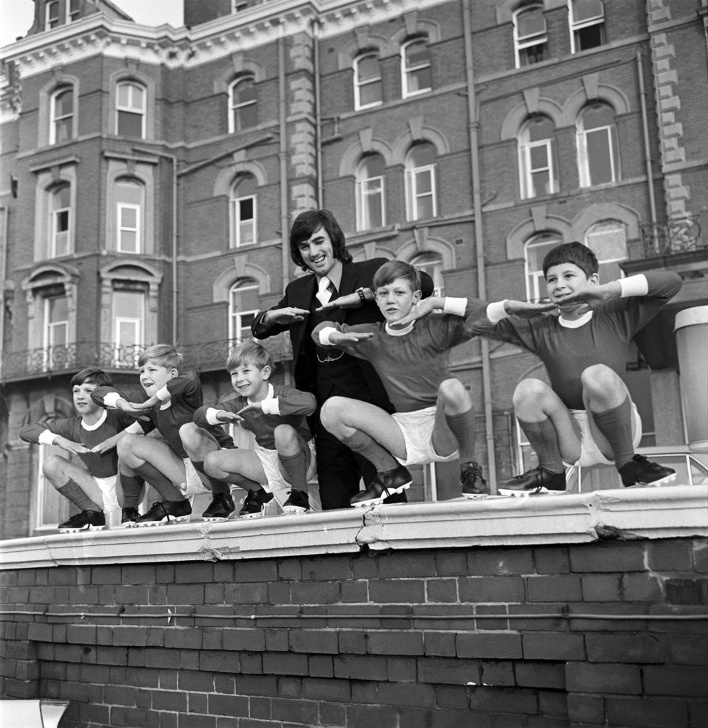 Detail of George Best with kids, Blackpool, 1970 by Staff