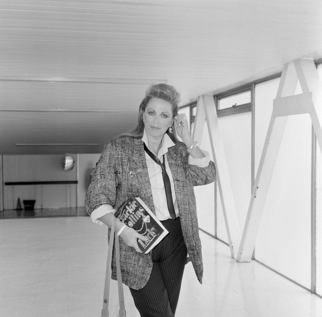 Detail of Jackie Collins arriving at Heathrow Airport from Los Angeles. She is in the UK for the publication of her new book 