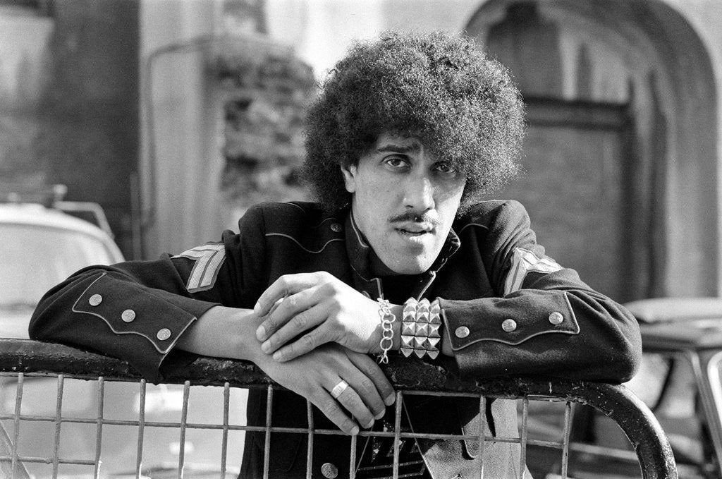 Detail of Phil Lynott of Thin Lizzy during a recording session for the groups new album. by Peter Stone