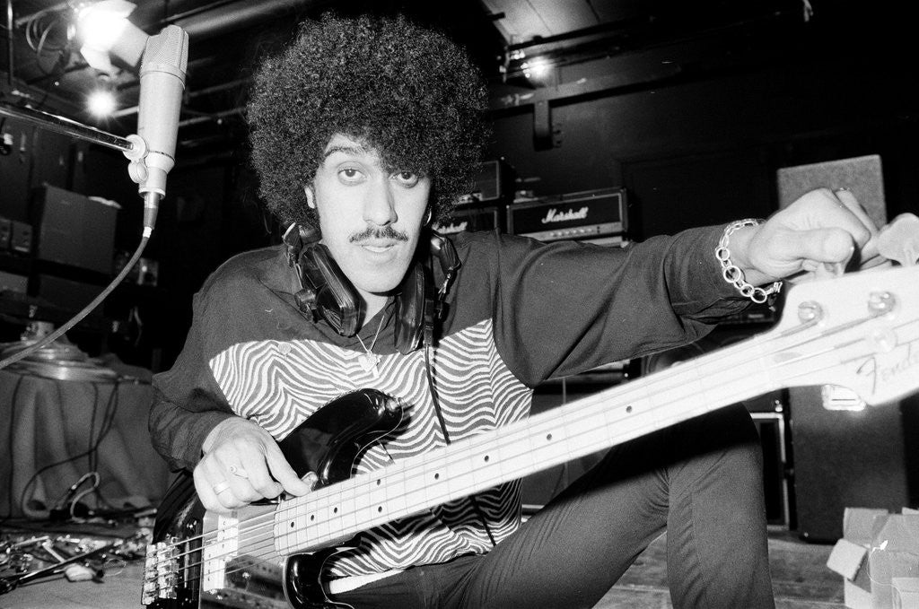 Detail of Phil Lynott of Thin Lizzy during a recording session for the groups new album. by Andy Hosie