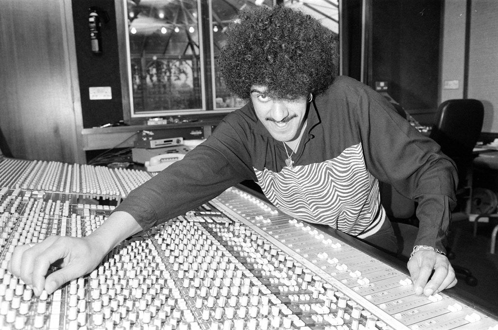 Detail of Phil Lynott of Thin Lizzy during a recording session for the groups new album. by Andy Hosie