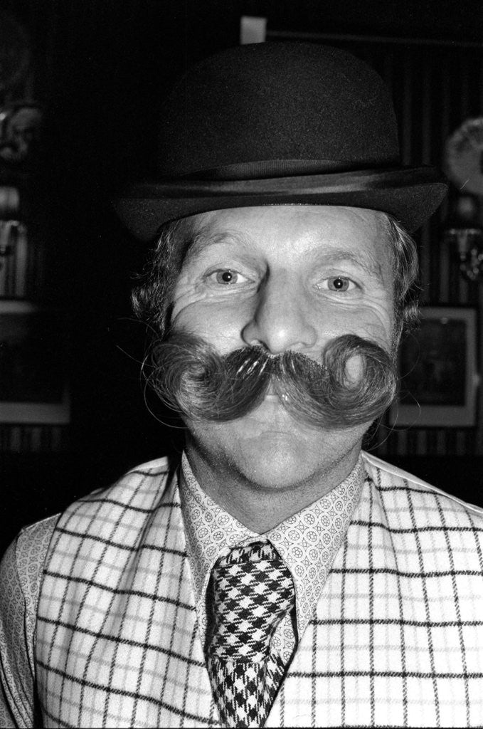 Detail of Bobby Moore preparing for the opening of his own public house by Kent Gavin