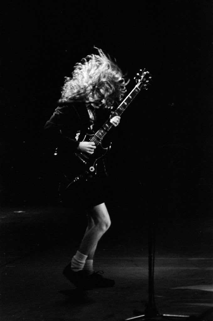 Angus Young from the group ACDC by Staff