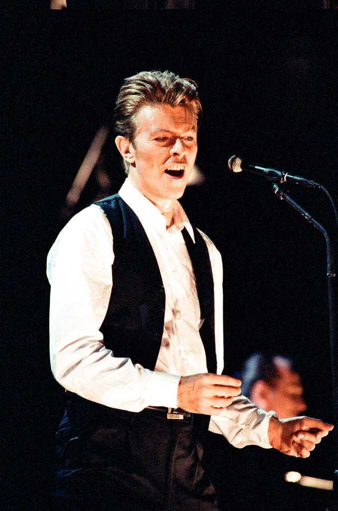 Detail of David Bowie performing at The Birmingham NEC, as part of his 1990 Sound and Vision World Tour. by Dick Williams