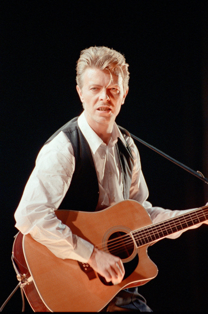 Detail of David Bowie performing at The Birmingham NEC, as part of his 1990 Sound and Vision World Tour. by Dick Williams