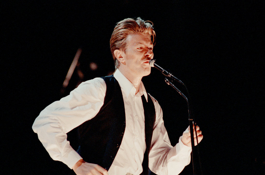 Detail of David Bowie performing at The Birmingham NEC, as part of his 1990 Sound and Vision World Tour. by Dick Williams