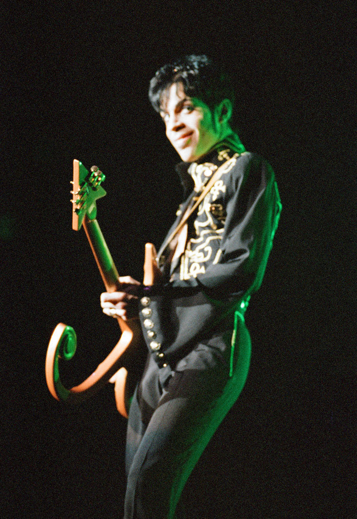 Detail of Prince performing on stage during his 'Ultimate Live Experience Tour' by Richard Nelmes