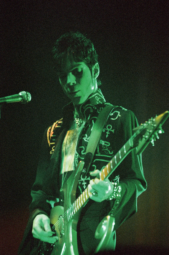 Detail of Prince performing on stage during his 'Ultimate Live Experience Tour' by Richard Nelmes