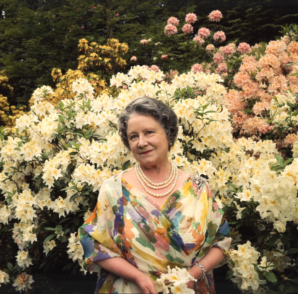 Detail of Queen Elizabeth, The Queen Mother in the gardens at Windsor Great Park by Cecil Beaton