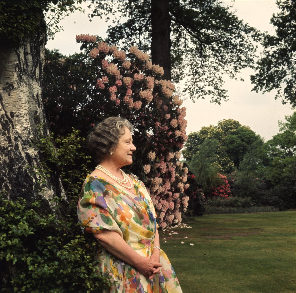 Detail of Queen Elizabeth, The Queen Mother in the gardens at Windsor Great Park by Cecil Beaton