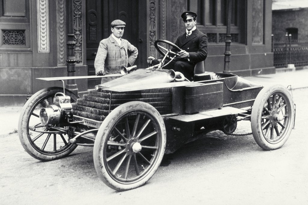Detail of Montague Graham White at the wheel of Wolseley racing car by Lafayette Portrait Studios