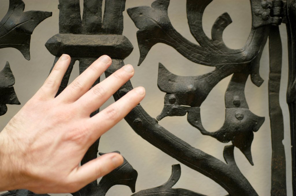 Detail of Grille and Hand by Stuart Cox