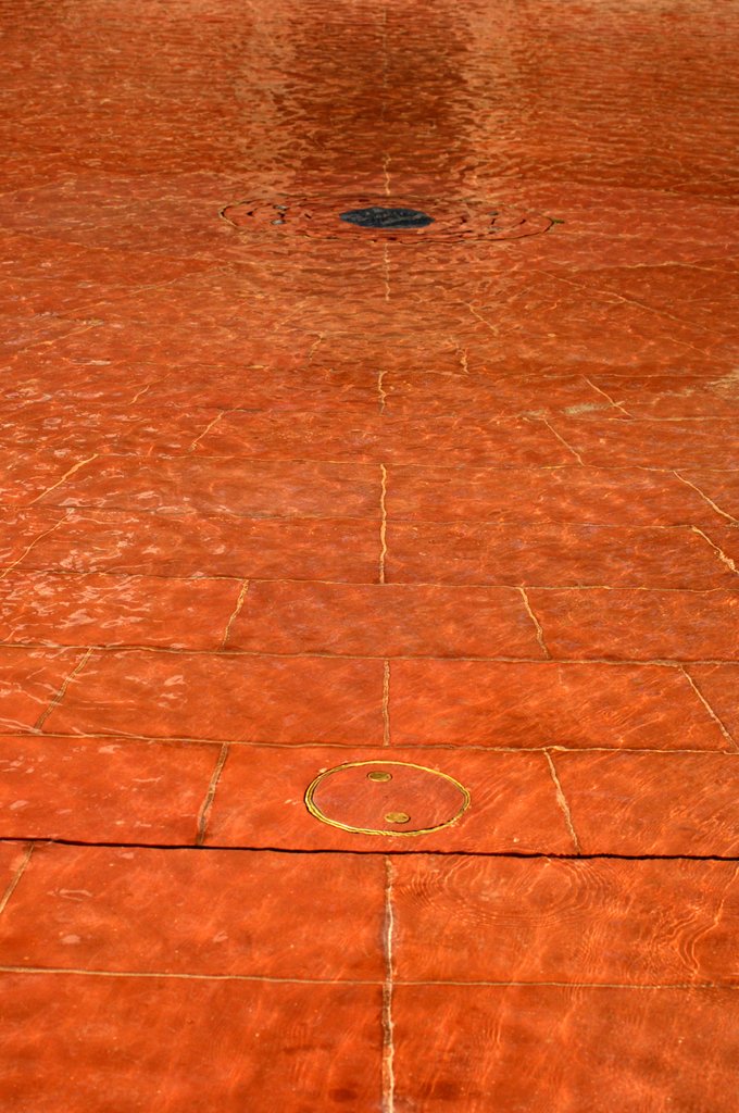 Detail of The colour of the building reflected in the pool in the John Madejski Garden of the V&A Museum by Stuart Cox
