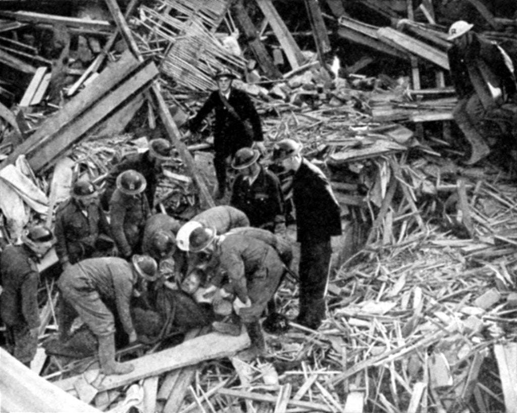 Detail of Rescue workers releasing a man from a bomb damaged building, World War II, 1940 by Unknown