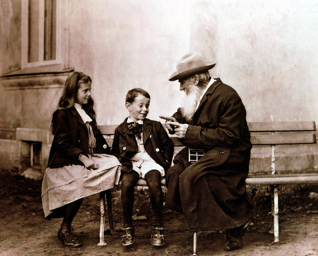 Detail of Leo Tolstoy, Russian writer, philosopher and mystic, telling his grandchildren a story, c1890-1910 by Unknown