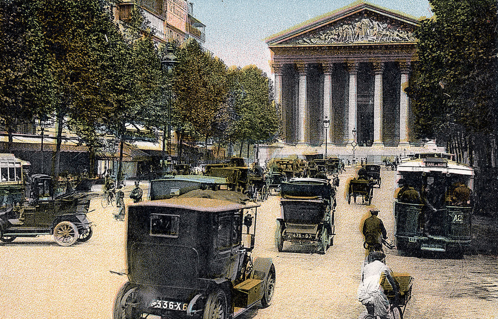 Detail of Rue Royale and the Madeleine, Paris, with cars and a motorbus on the street, c1900 by Unknown