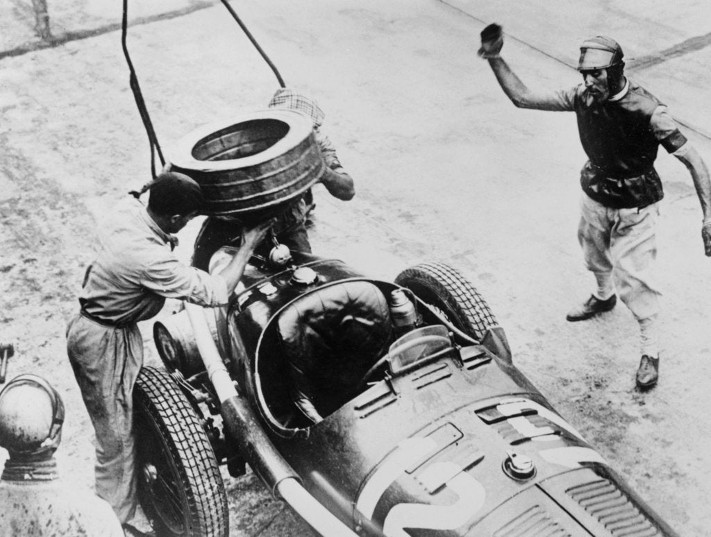 Detail of Tazio Nuvolari waiting for his car to be refuelled, c1930s(?) by Unknown