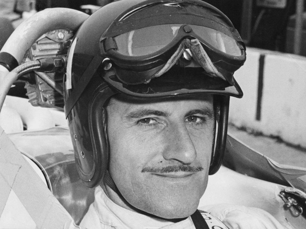 Detail of Graham Hill in cockpit of Lola T90 by Anonymous