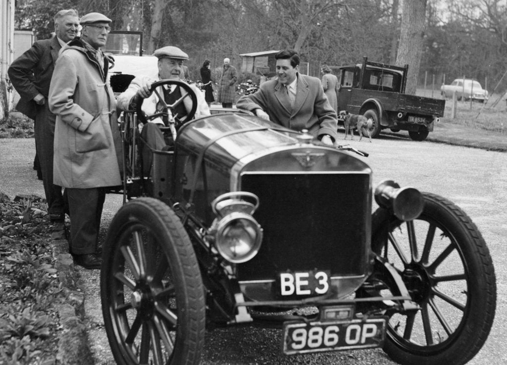 Detail of Lord Brabazon in the driver's seat of a vintage car, 1956 by Unknown