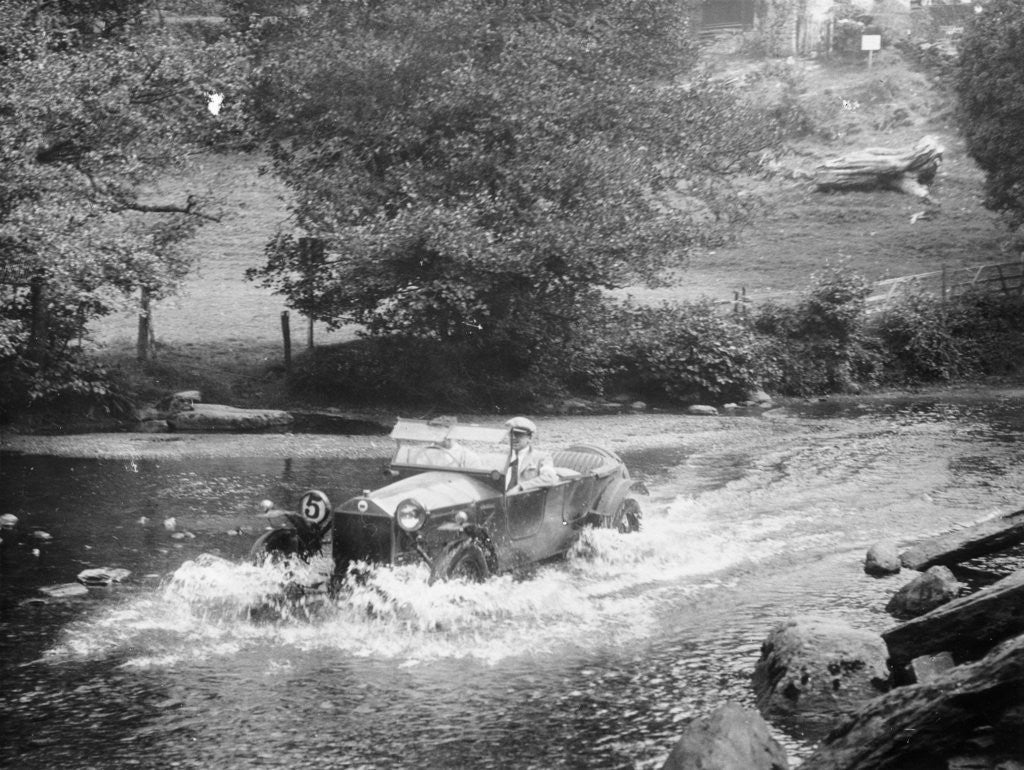 Detail of A Lancia Lambda being driven through water by Anonymous