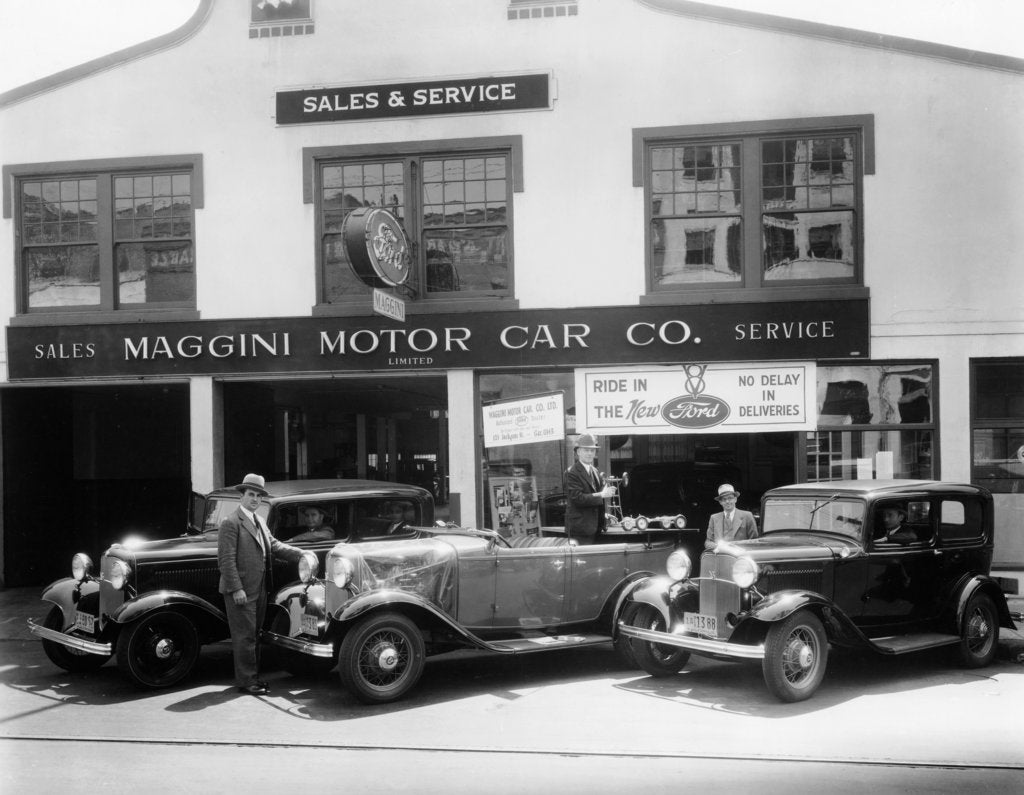 Detail of 1932 Ford V8 in front of a car showroom, (c1932?) by Unknown