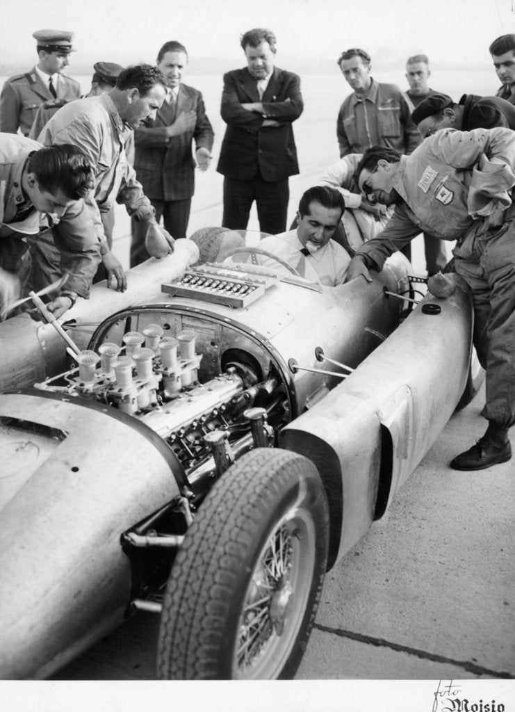 Detail of Alberto Ascari at the wheel of the new Lancia Grand Prix car, 1955 by Unknown