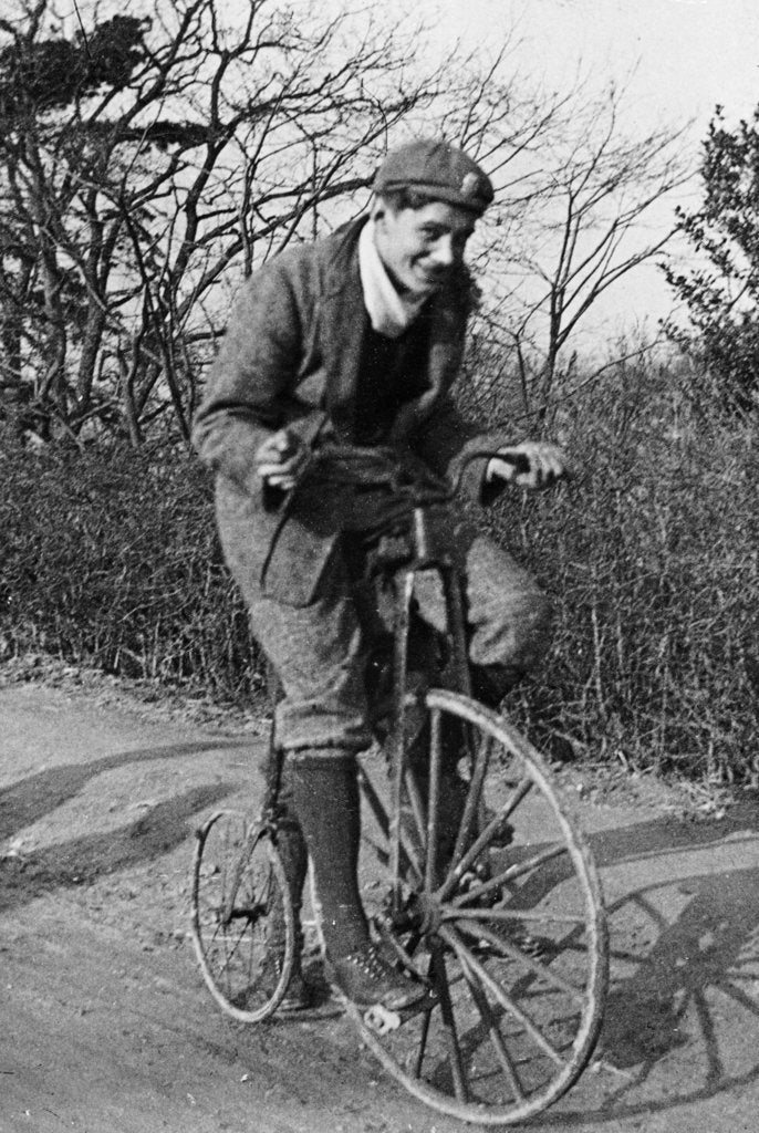 Detail of A young Lord Nuffield riding a bicycle down a country lane by Unknown