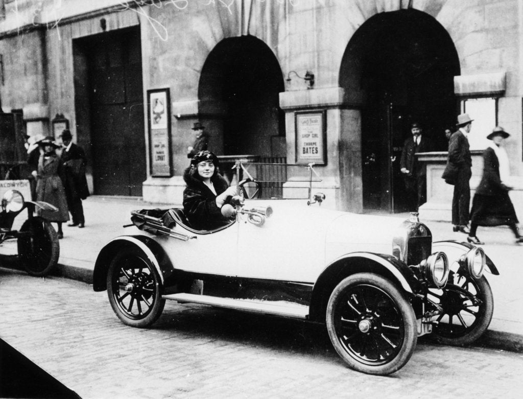 Detail of Miss Evelyn Laye sitting in a parked car, (1920s?) by Unknown